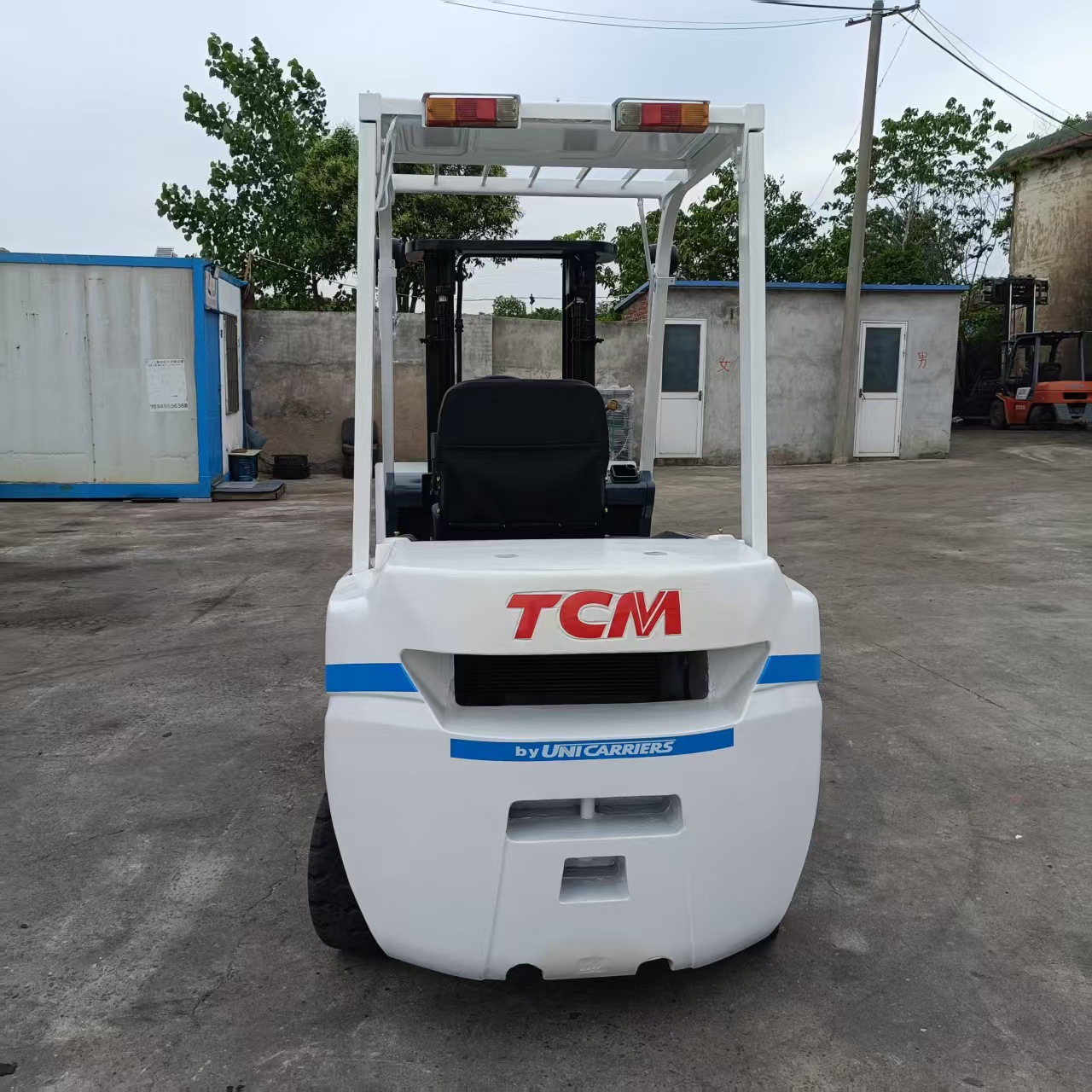 Japón importado TCM carretilla elevadora de segunda mano hidráulica de 2,5 toneladas almacenamiento de carga alta TCM eléctrica de combustión interna