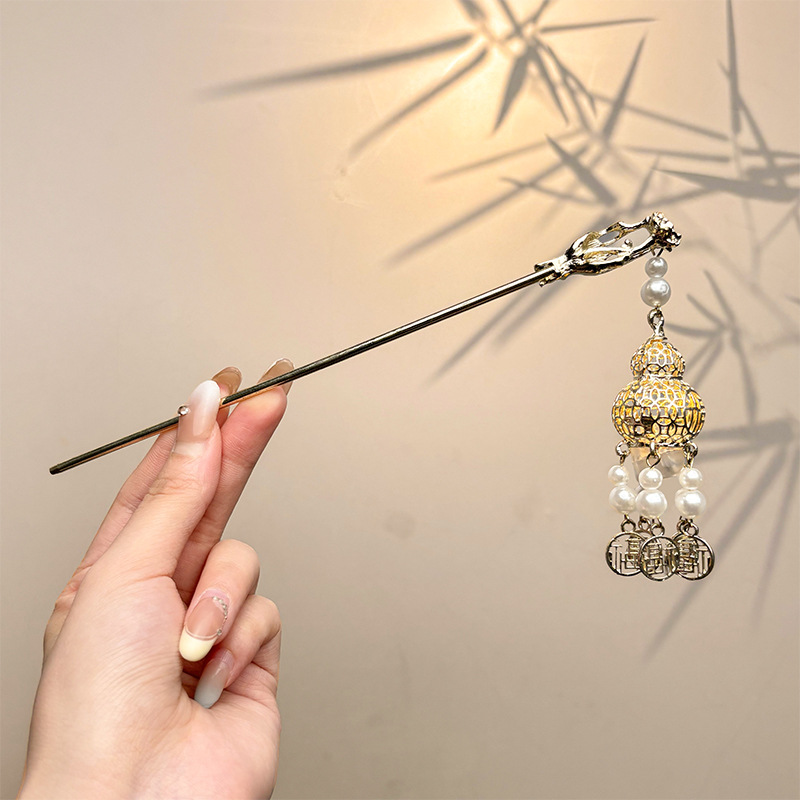 Nueva horquilla china 2025 nuevo estilo estilo antiguo horquilla mujer falda de cara de caballo de alta calidad estilo nacional horquilla de madera paso a paso horquilla tocado