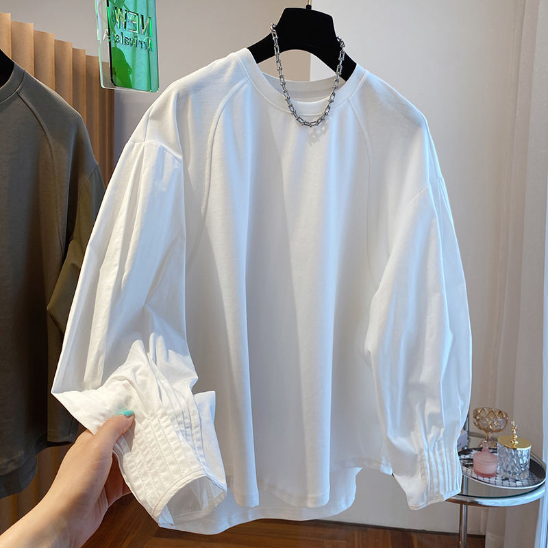 A stylish, loose-fitting white lantern sleeve shirt/sweatshirt with patchwork design, perfect for autumn, long-sleeved base layer, t-shirt, or thin top.