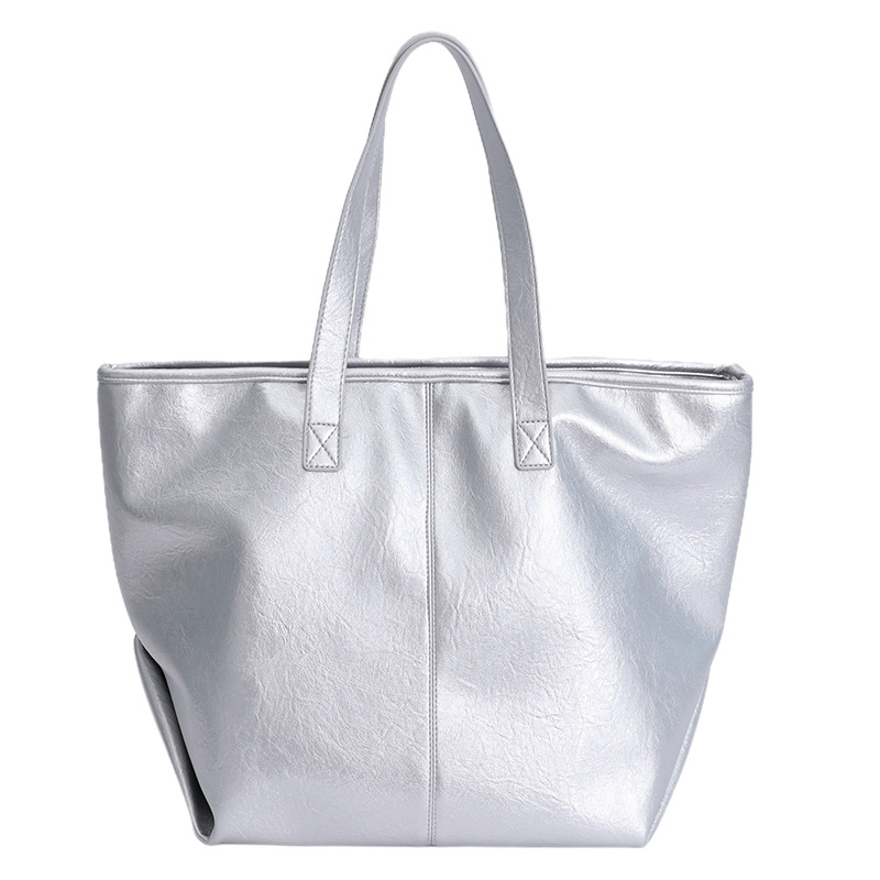 Bolsa de moda retro de gran capacidad para mujeres 2025 nueva simple versátil alta sensación de mochila de viaje diario