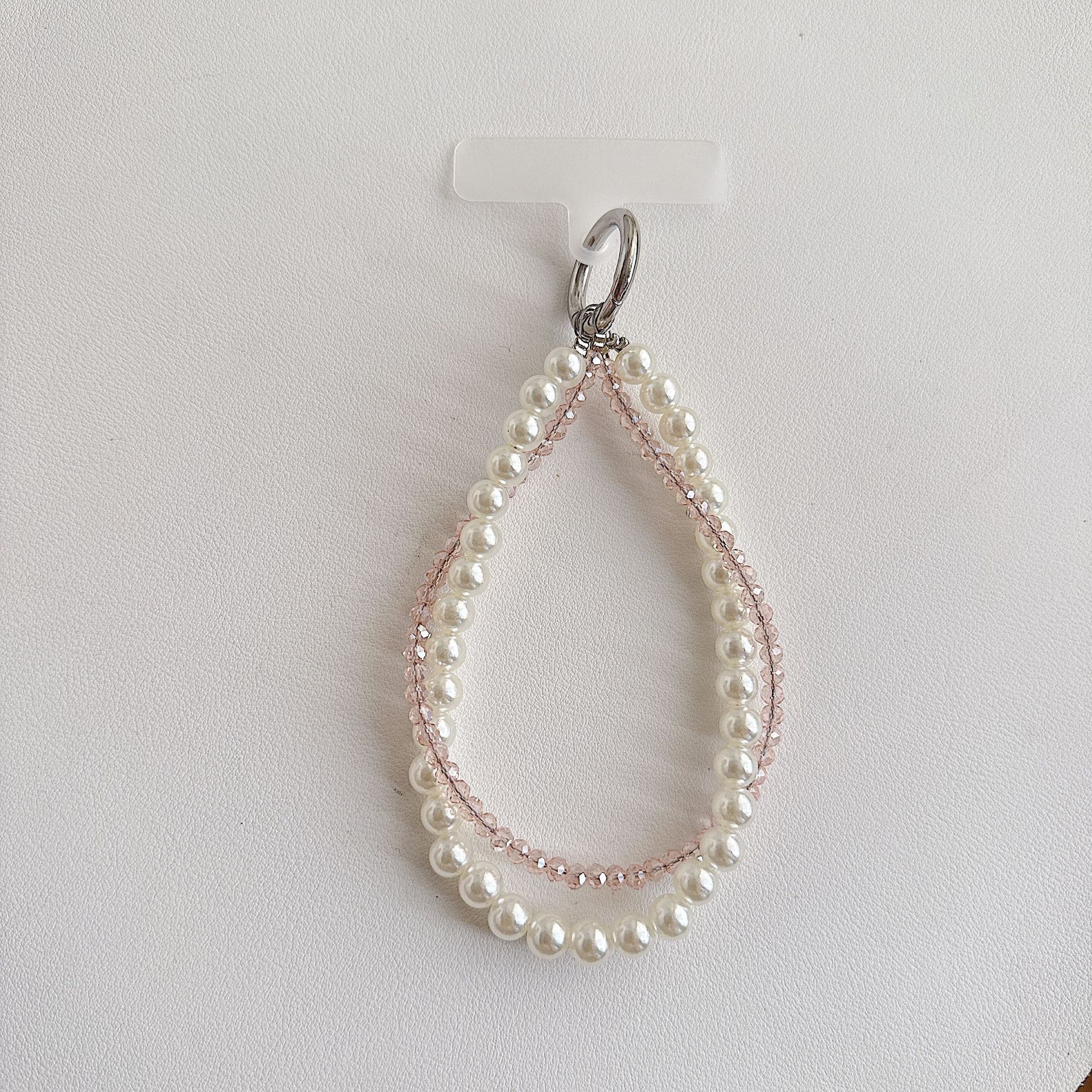 Boutique hecho a mano de alta gama teléfono móvil cadena colgante mujer estilo ins cristal coreano perla enrollamiento cadena de muñeca moda corta