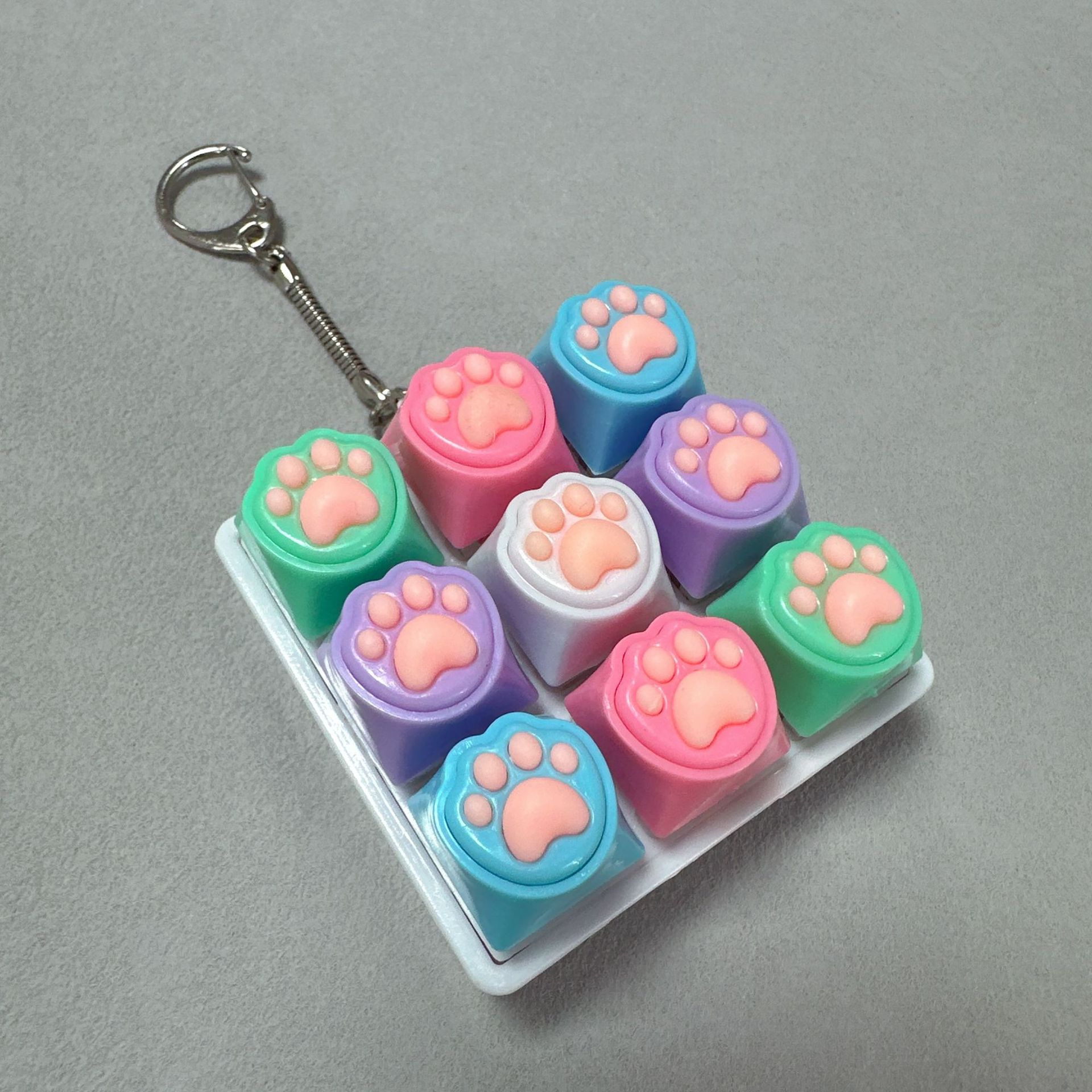 Nine-key white shell-color silicone cat claw d