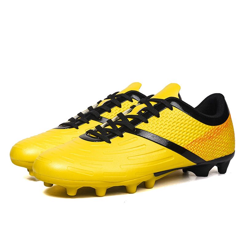 2025 nuevos zapatos de fútbol juvenil de clavos largos transfronterizos para hombres y mujeres zapatos de entrenamiento de competencia de estudiantes fábrica