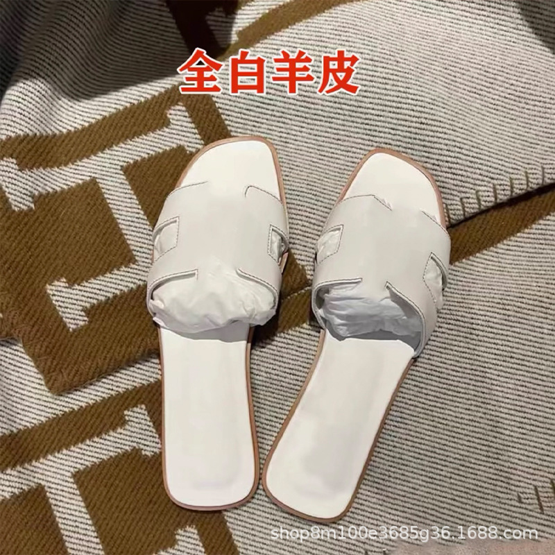 鼎羊皮の新型真皮平底ネット赤同タイプのスリッパ女性夏外着一字引きビーチカジュアル太さと涼しさ引き