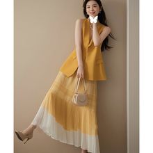 夏天搭配一整套时尚2025新款超好看减龄橙色马夹格纹半身裙两件套