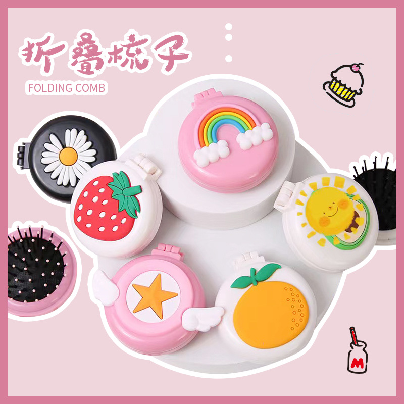 De dibujos animados integrado mini peine plegable cojín de aire peine portátil chica abrigo de aire masaje peine macaron peine venta al por mayor