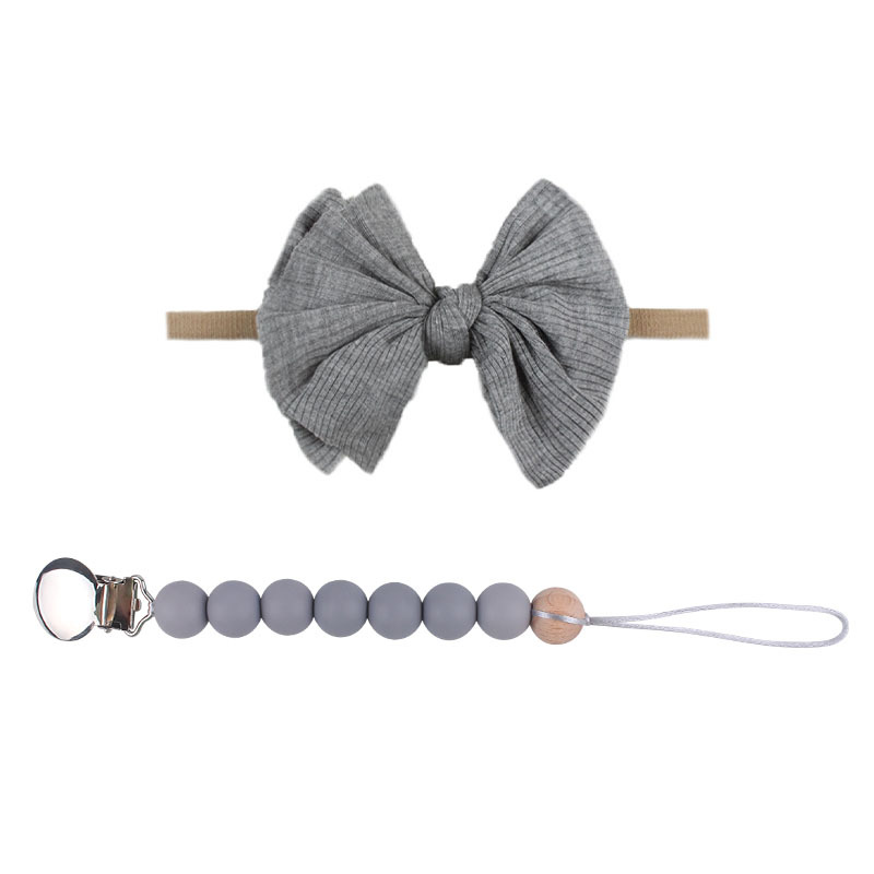 Accesorios para el cabello del bebé de Europa y América del arco de nylon banda para el cabello bebé suministros bebé chupete de silicona pezón anti-caída traje de cadena