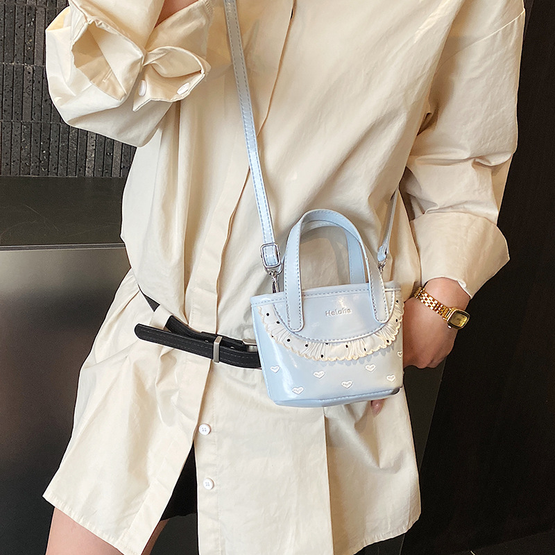 Amor extranjero en relieve, bolsas de cestas para niños y niñas, bolsas de mano de encaje dulce coreana, nuevas bolsas de niños transfronterizas