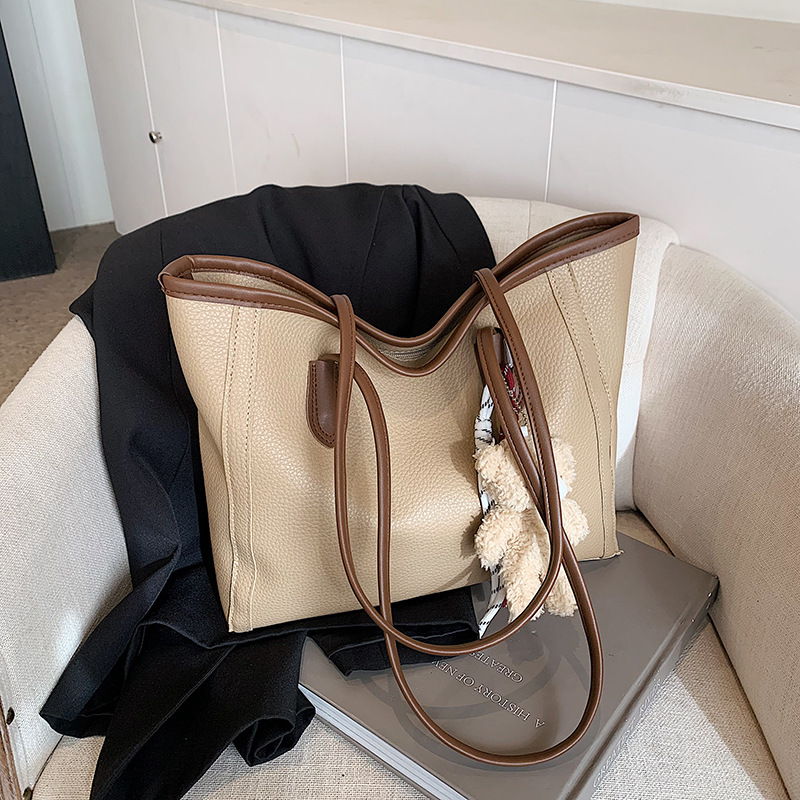 2024 invierno nuevo colgante de moda casual de gran capacidad de alta calidad para mujeres bolsas de viaje de hombro bolsas axila