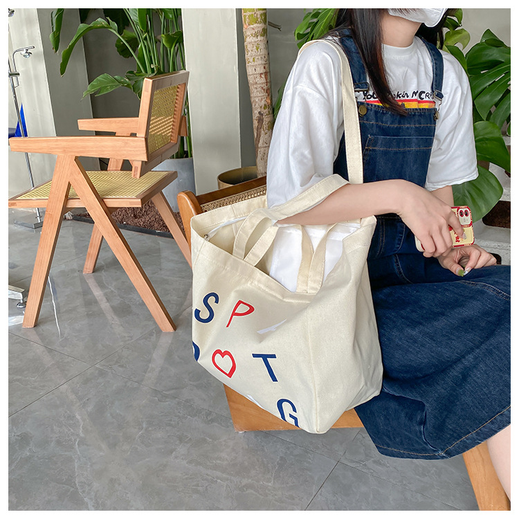 A large-capacity, sturdy Japanese-style canvas bag for women, a new 2022 simple bento handbag for girls to go to work undefined