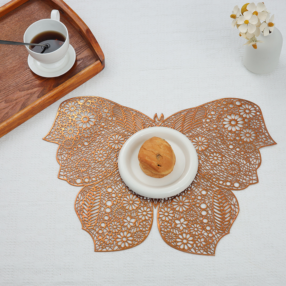 Nueva mariposa placemat hueco dorado PVC occidental placemat polvo de plata aislamiento térmico antideslizante estera de mesa de montaña restaurante Decoración