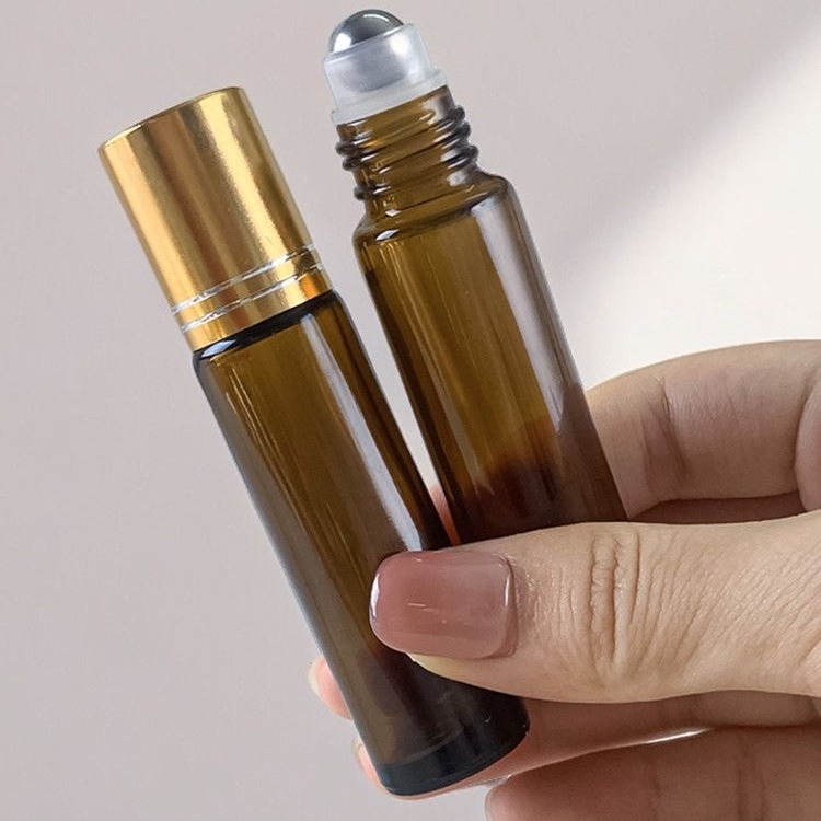 En stock 10ml botella de aceite esencial cuentas botella vacía cosméticos portátil esmerilado medicina aceite bola cabeza de bola de acero