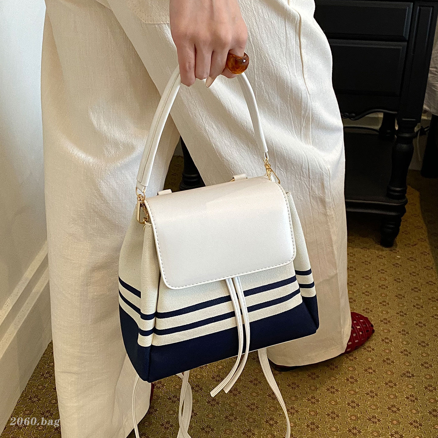 Mochila de moda coreana multifuncional de gran capacidad para mujeres rayas diarias nuevas mochilas ligeras para mujeres 2026