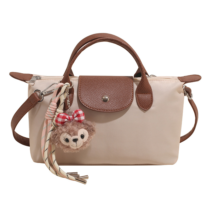 Bolsa de mano francesa de nicho Zhonglong para mujeres 2025 nuevo paquete de hombro casual universal para viajar bolso de alta calidad