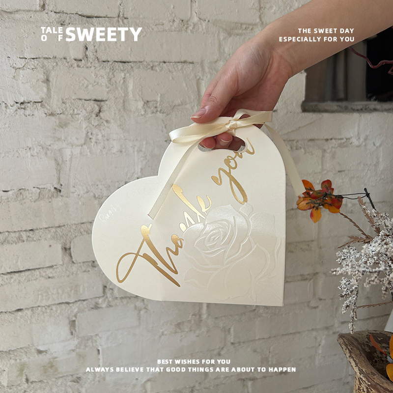 Nueva caja de dulces de boda bolsas de dulces portátiles de nicho simple caja de dulces de boda caja de regalo de alta calidad caja de papel