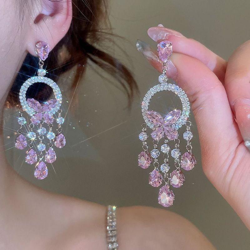 Agujas de plata transfronterizas flores de zircón aretes de bordillo estilo de moda pernos de auriculares lujosos de alto nivel de diseño de auriculares nicho
