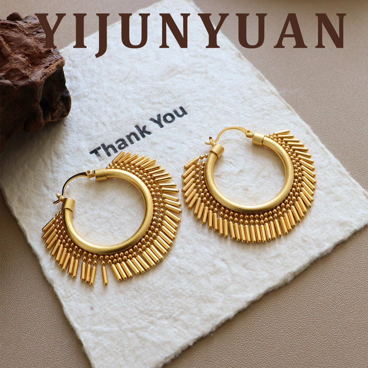 Retro fashionable golden small design earrings with tassels