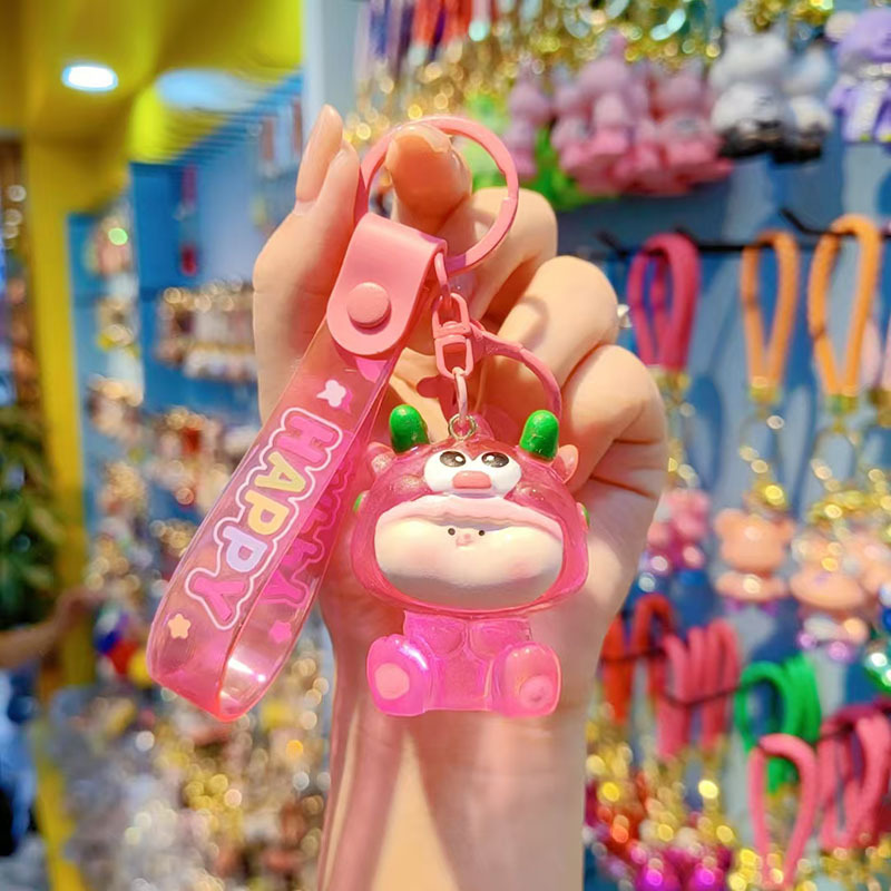 Caricatura Lilith dragón lindos colgantes de resina transparente bolsos de automóviles colgantes de llaves al por mayor