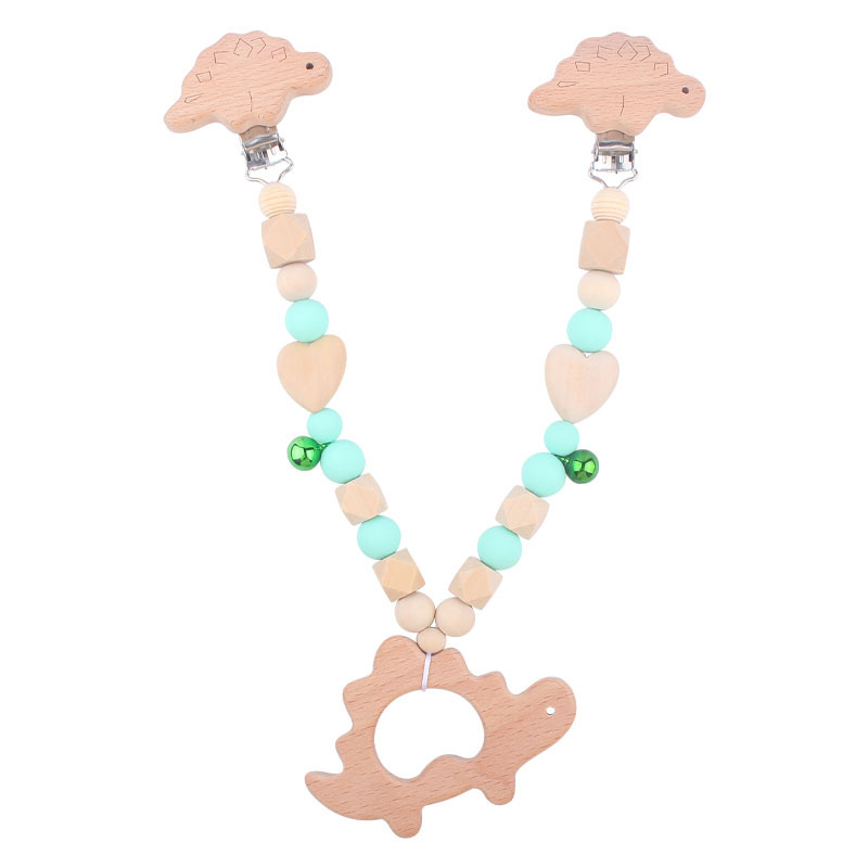 Suministros para bebés pulsera de silicona molar de juguete para niños Cadena de cochecito de dinosaurio de tres piezas creativa pequeña campana colgante