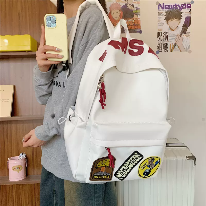 书包新款森系简约百搭校园双肩包男小学生女大容量纯色通勤背包