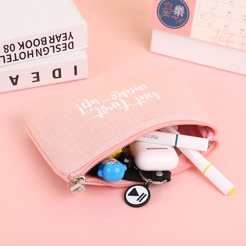 [Ventas directas de fábrica] diario simple carta bolsa de cosméticos portátil auricular bolsa de almacenamiento de monedas bolsa de viaje del estudiante