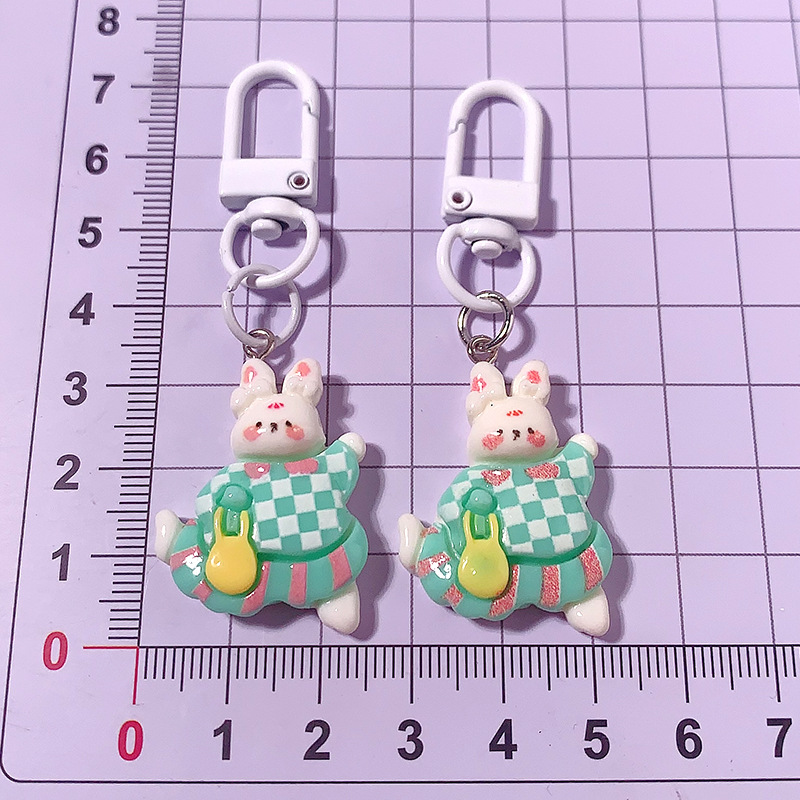 Cartoon verano viaje conejo llavero in dulce chica amiga regalo mochila colgante accesorios de resina, etc.