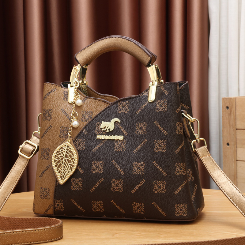 Bolsos de mujer 2025 nuevo bolso de moda de gran capacidad Tote bolso de mujer bolso de mensajero de hombro salvaje mujer transfronteriza