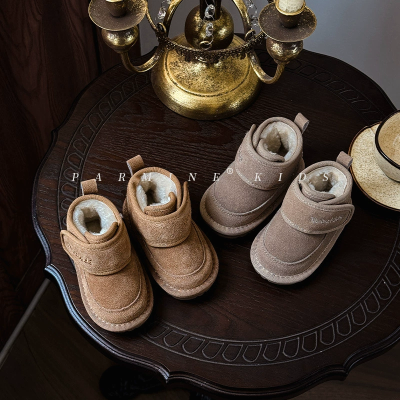 Кожаные детские плюшевые хлопчатобумажные сапоги зимние новые мужские и женские детские мягкие сапоги