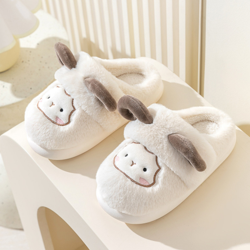 Caricatura de dibujos animados zapatillas de algodón interior lindas bolsas de lana tacones zapatillas de algodón pisar sensación de diseño de invierno zapatillas cálidas