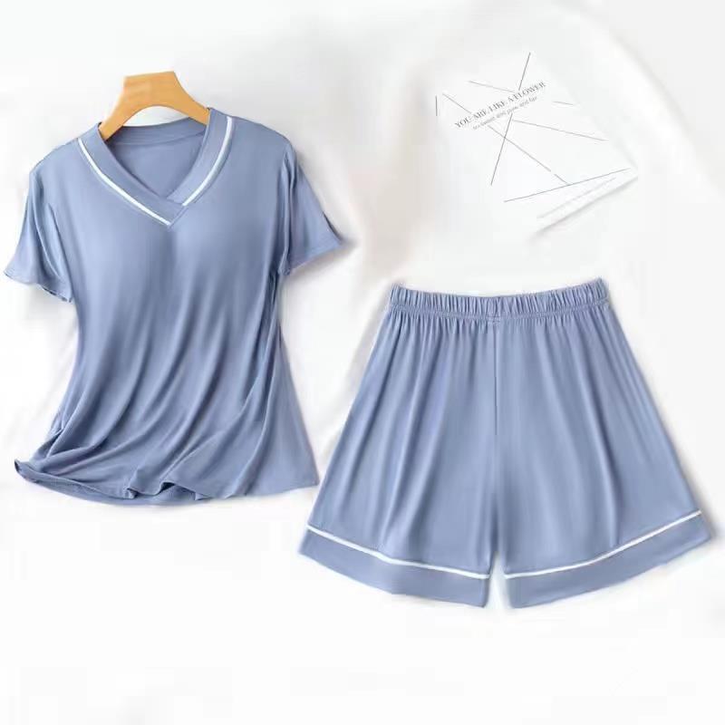 Pijamas de verano Pantalones cortos de manga corta para mujer con almohadilla en el pecho color sólido Delgado dulce suelto desgaste exterior simple traje de desgaste para el hogar