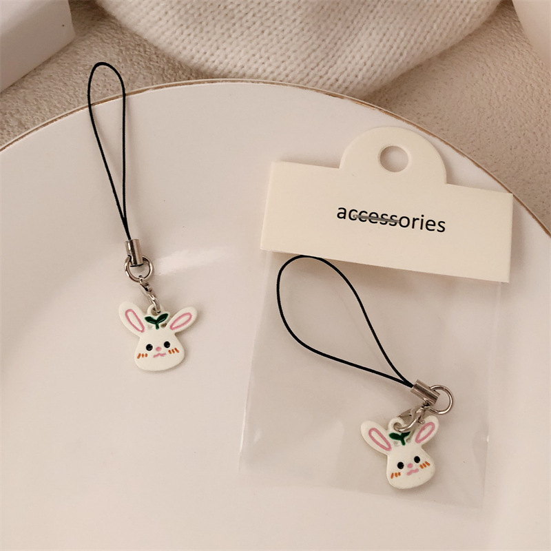 Nuevo colgante de joyería de bricolaje, colgante de bolsa de conejo de aleación de aceite de goteo, colgante de teléfono móvil de conejo blanco lindo