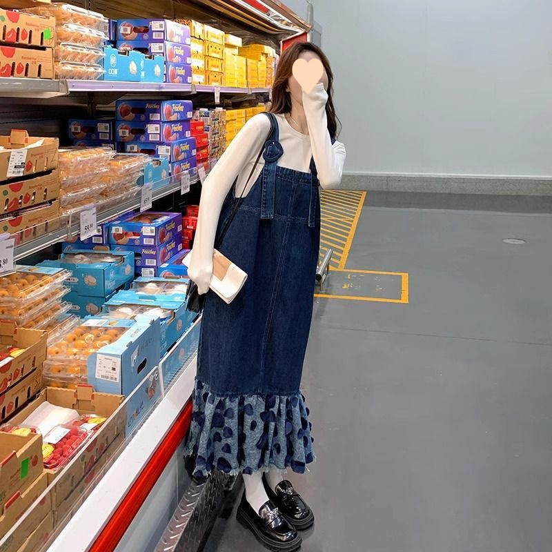 韓国のデニムの背もたれのワンピース2025春と秋の新型学院の風の花びらの2つのセットはやせている長いスカートを現します。|undefined