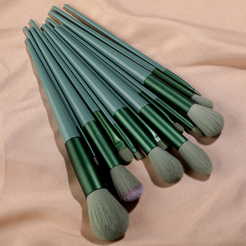 Inventario nuevo 13 cuatro estaciones set de cepillo de maquillaje azul portátil blush de pelo suave sombra de ojos conjunto completo de herramientas de maquillaje al por mayor
