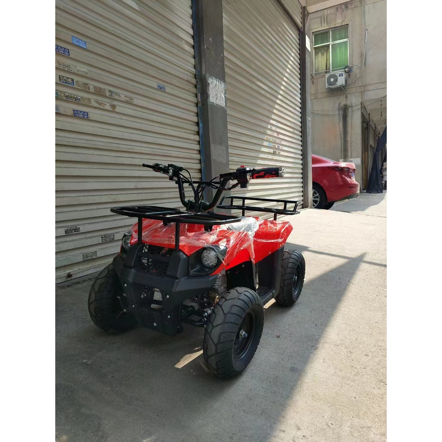 Little King Kong 49CC mini 2 tiempos ATV de cuatro ruedas motocicleta de montaña se puede encender y arrancar