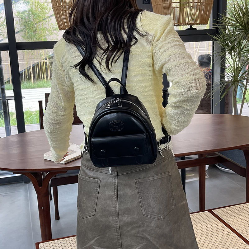 2025 mochila coreana de mujer simple color sólido mini mochila nueva bolsa de viaje ligera para mujeres