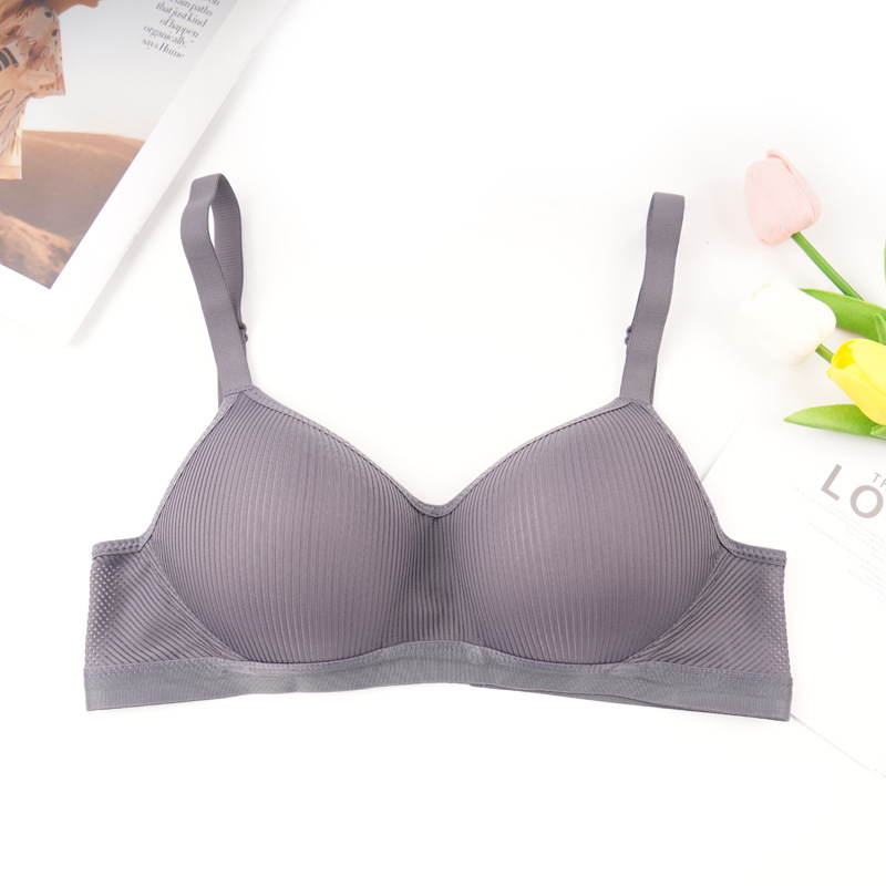 Fábrica de Shantou en stock sin anillo de acero para mujeres sujetadores ligeros delgados transpirables cómodos sin marcas de ropa interior sujetadores