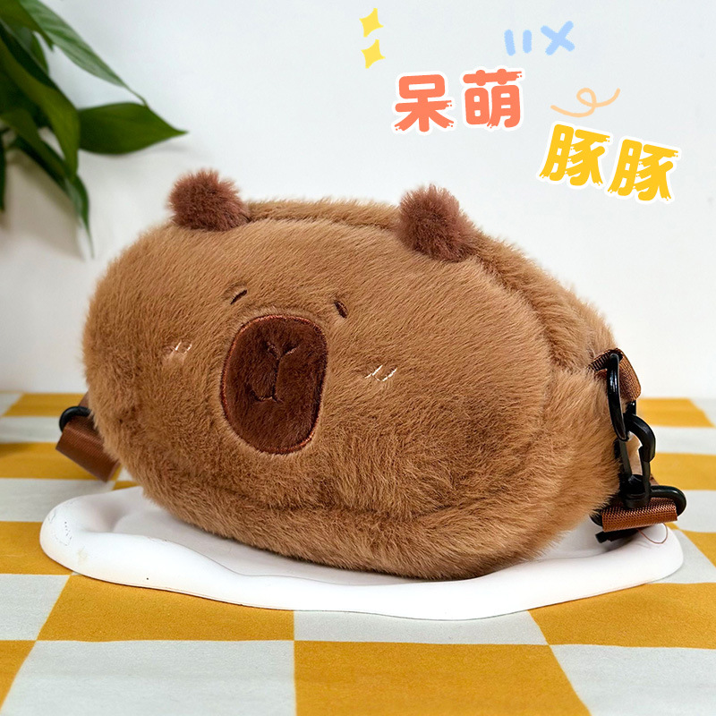 Transfronterizo Kapibara bolsas de peluche dibujos animados portátiles muñecas lindas juegos de ciudad tijeras agarrar bolsas de muñecas