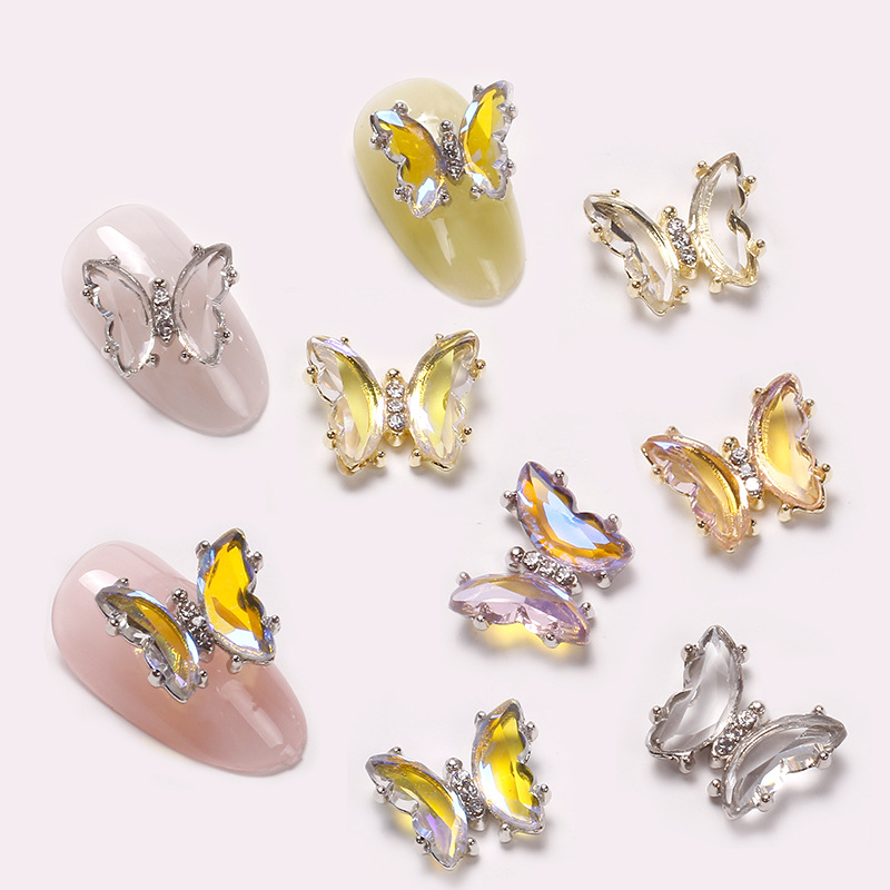 Red famosa nueva mariposa perforación joyas de manicura aleación tridimensional mariposa cristal permeación de hielo insins viento cristal mariposa perforación