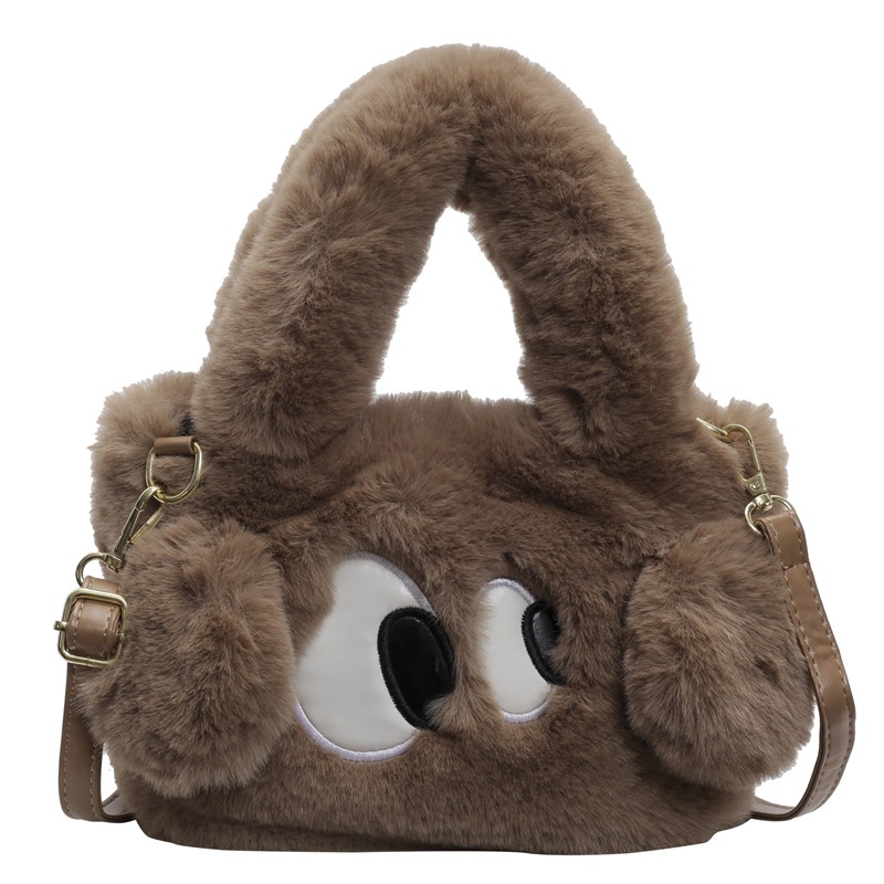 Bolsa de cubo de pelúcia de ojos grandes perros mujeres otoño y invierno 2025 nuevo tipo de bolso de hombro, bolso de mochila encantador