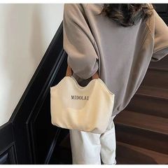 2025 新しい絶妙なファッションキャンバスバッグ韓国スタイルの高価値シングルショルダー多用途バッグカジュアルクラス通勤トートバッグ