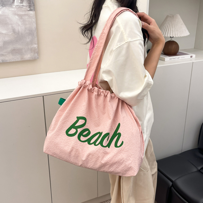 韓国版の新しいレタープリントカジュアル大容量トートバッグ軽量旅行多用途レイジースタイル巾着ショルダーバッグ|undefined