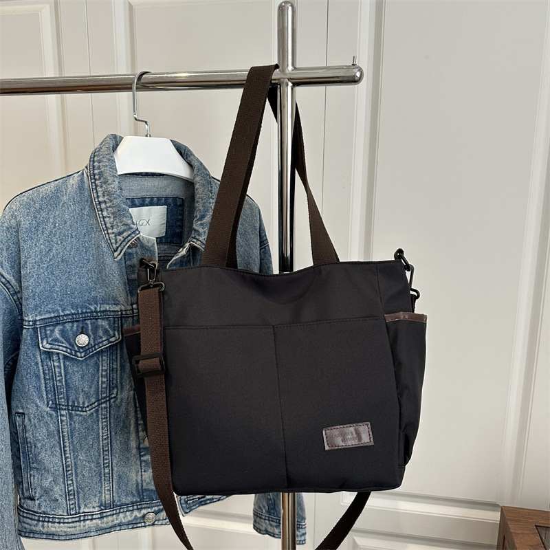 Bolso de lona coreano para mujeres nueva moda ocio de gran capacidad mochila portátil tote simple bolso de hombro para estudiantes