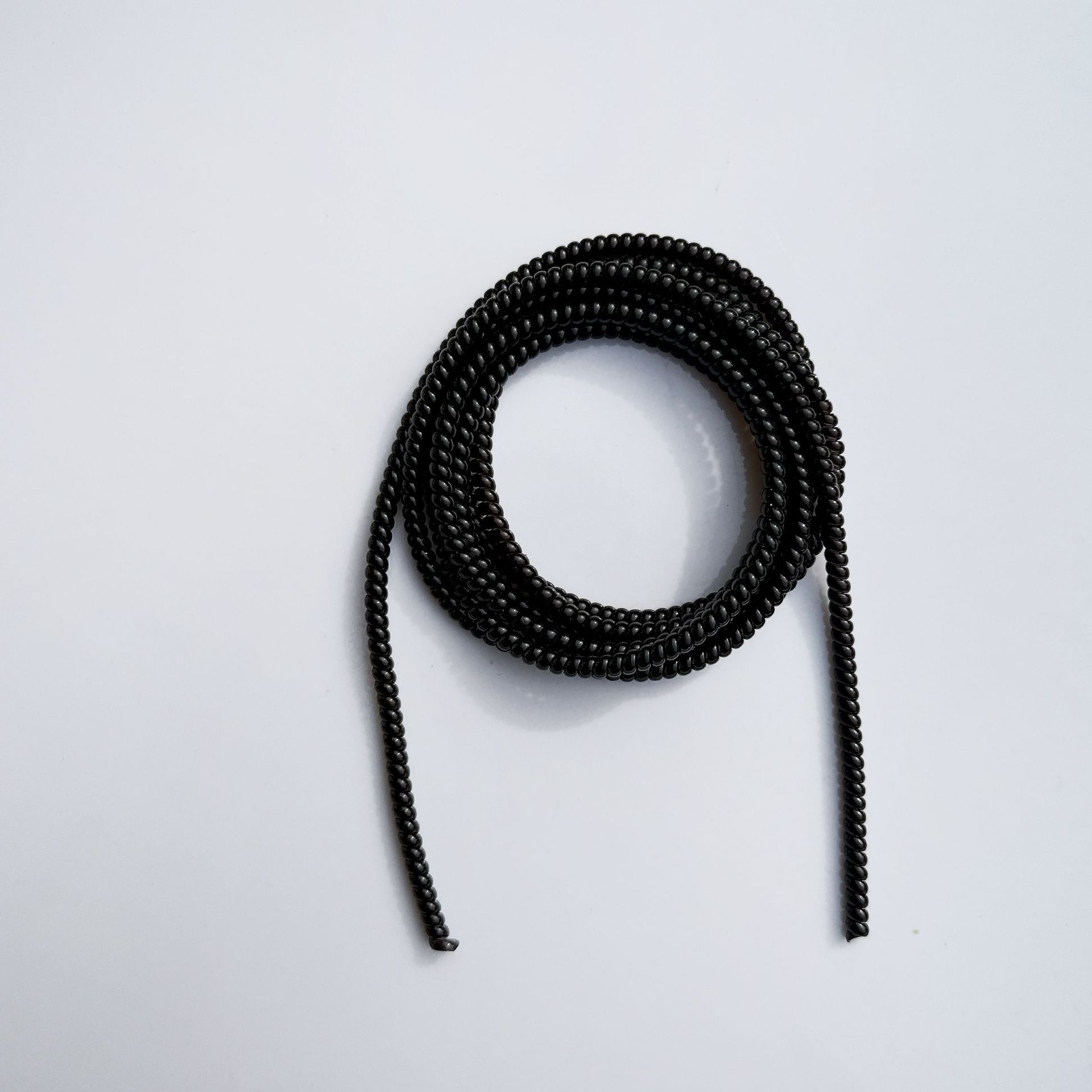 1.4 Cuerdas de protección de color sólido de 1,6 metros de cable de datos para línea de teléfono celular anti-ruptura cargador de cable de bobinado