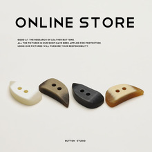 莫森 牛角尖两孔眼纽扣树脂绳扣子女羽绒服外套装饰双面尼大衣扣