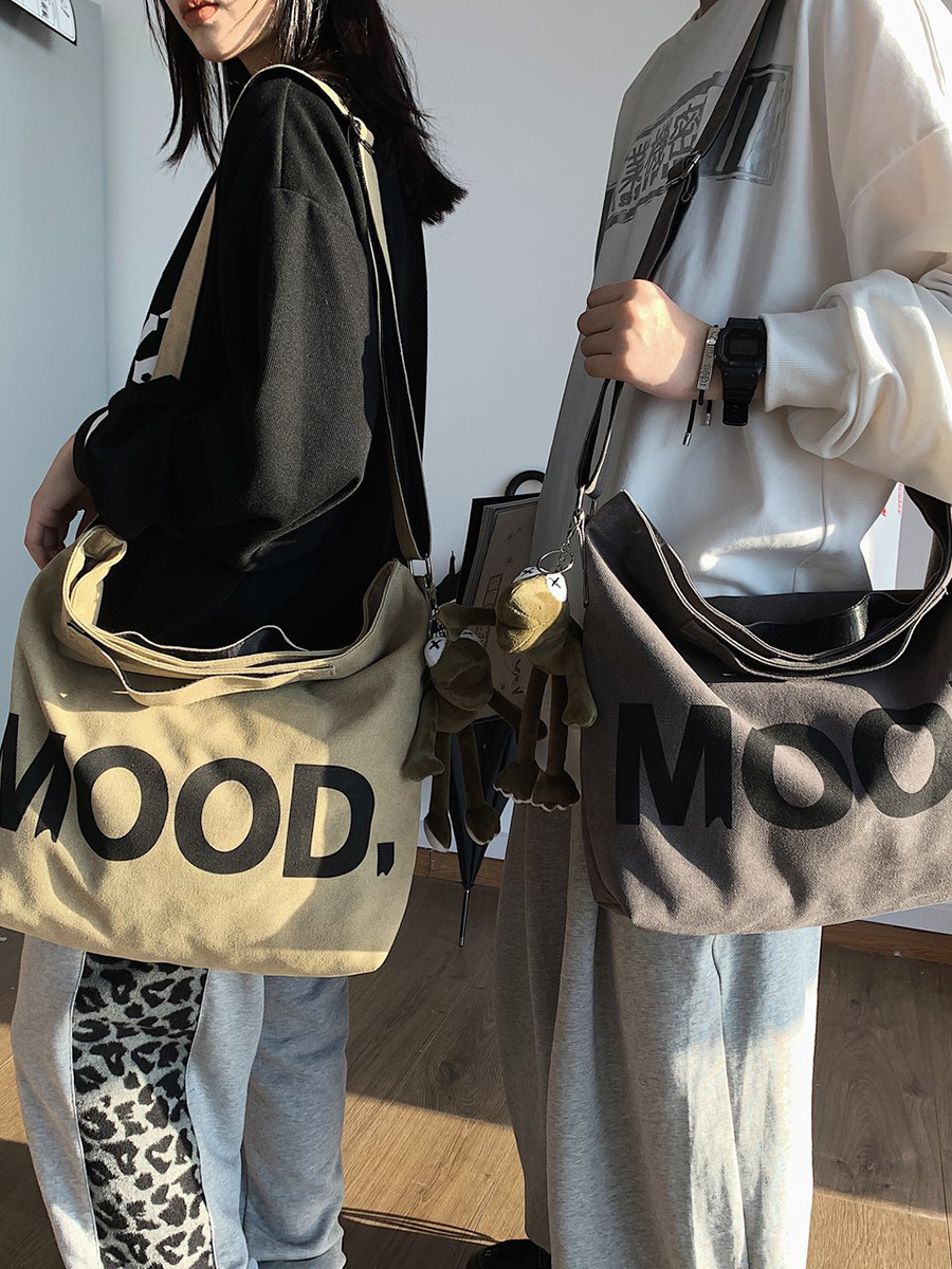 Bolsa de lona de gran capacidad para hombres un solo hombro mochila 2024 nueva bolsa de tela japonesa casuales bolsas de mano bolsas de correo mujeres