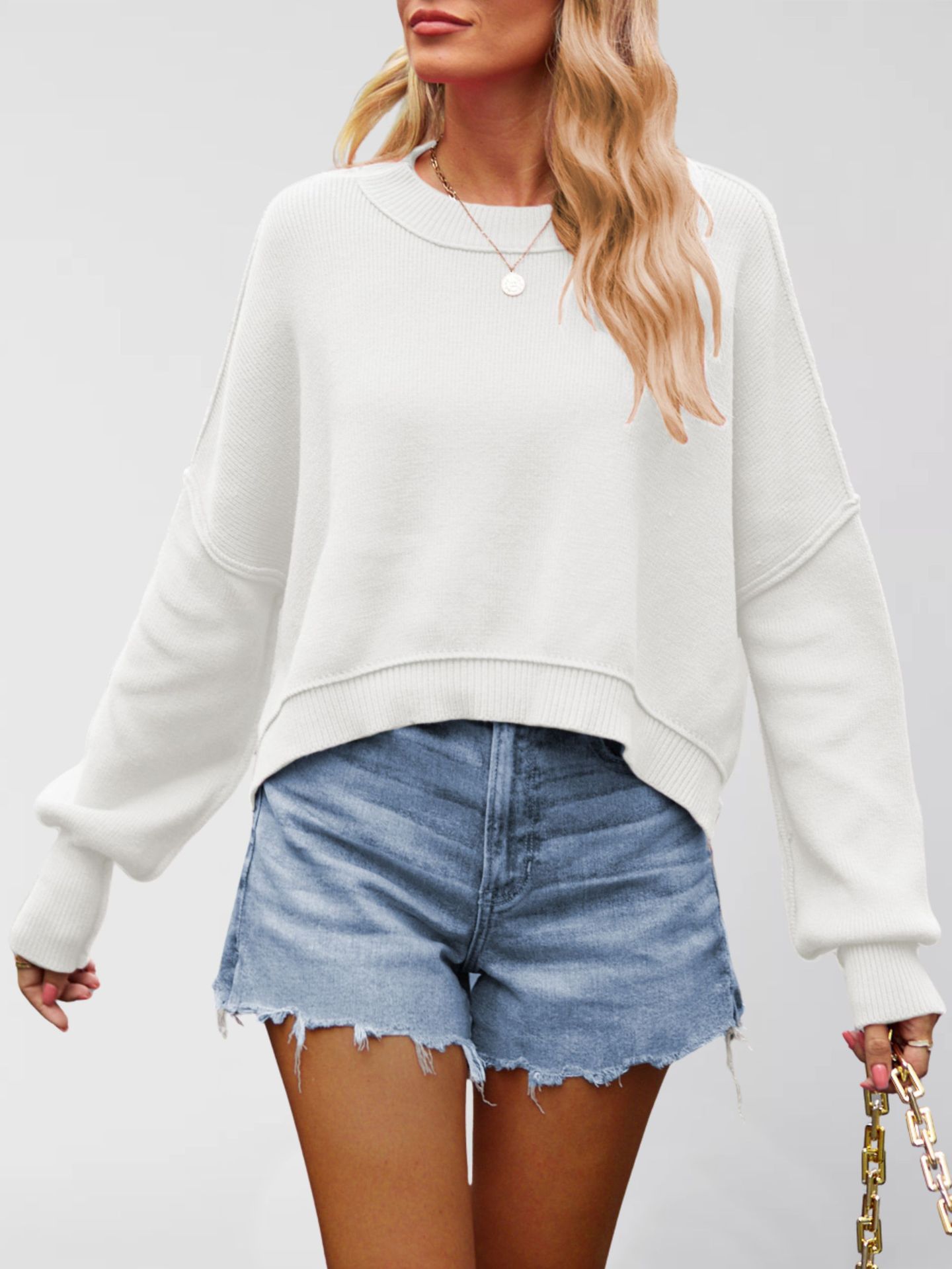 Suéter de punto holgado de color liso con cuello redondo para mujer, nueva moda europea y americana de otoño/invierno 2026, para comercio exterior.