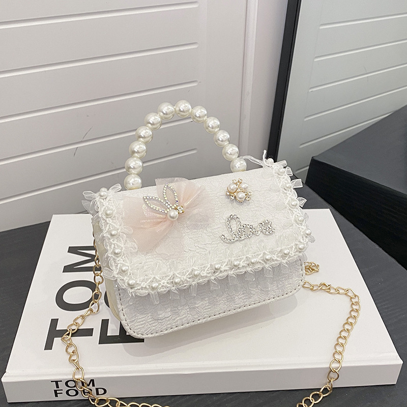 Nuevo tipo de bolso para niños, moda perla portátil, bolso de hombro de la princesa Aisha, estilo extranjero, bolso de hombro para niñas lindas