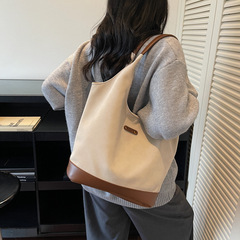 休闲大容量女式腋下包2025新款简约手提水桶包百搭单肩包一件代发