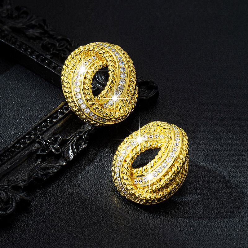 Stone inlay with pigtail with zircon