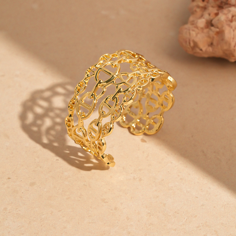 Europa y América plisada redonda abierta pulsera de metal estilo frío pulsera personalizada luz lujo alto sentido pulsera fábrica al por mayor